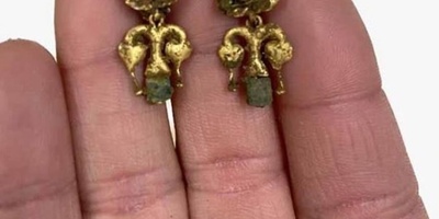 Astounding Ancient Mummy Discovered Wearing Clothes and Gold Jewelry [Photos]