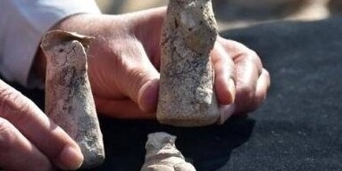 Images: Discovery of 7,000-Year-Old Human Figurines Wearing Unusual Hats