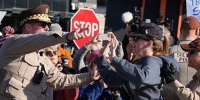 Clash Outside Chicago-Area Immigration Facility Leaves Protesters Arrested and Officers Injured