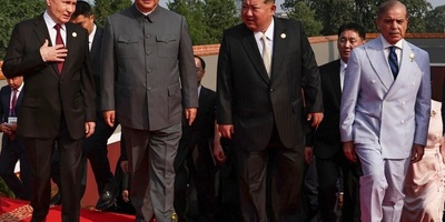 Putin Meets North Korea's Kim in Beijing (+VIDEO)