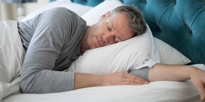 Why Some People Sleep With Their Hand Under Their Pillow