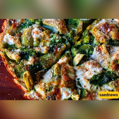 This Spinach & Artichoke Pan Pizza Will Make You Forget Thin-Crust Night