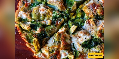 This Spinach & Artichoke Pan Pizza Will Make You Forget Thin-Crust Night