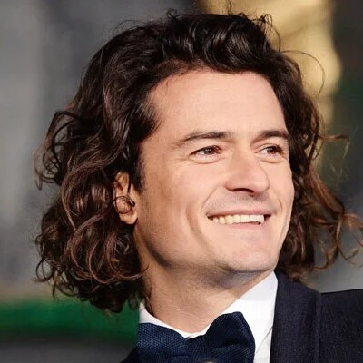 Watch Heartwarming Sweet Photos Orlando Bloom Shares with Son Flynn at Monterey Car Week: Wearing Matching Hats!