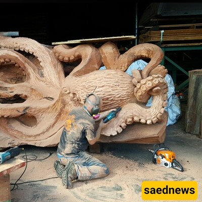[Video] Shining a New Light: Shirazi Artists Transform a Withered Tree into an Artistic Marvel in Just 40 Days!