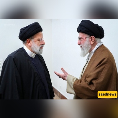 Rare Image Shows Ebrahim Raisi Humbly Paying Respect to the Supreme Leader’s Eldest Son
