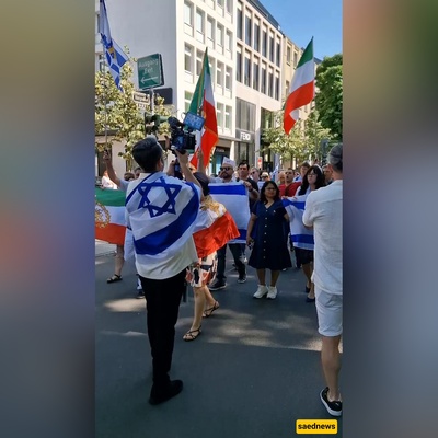 Outrage as Pahlavi Supporters Dance Beneath Israeli Flag Amid Strikes on Iran
