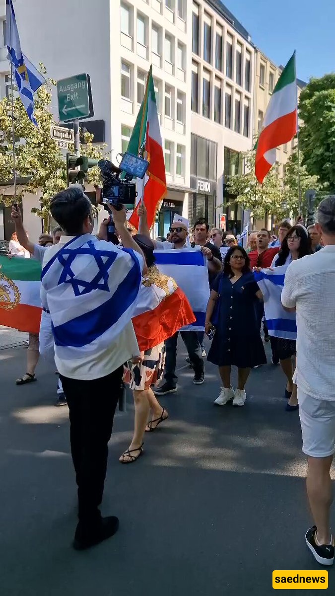 Outrage as Pahlavi Supporters Dance Beneath Israeli Flag Amid Strikes on Iran
