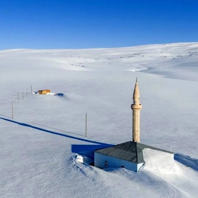 Stunning Images Of A Village Buried Under Heavy Spring Snowfall