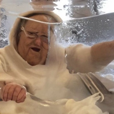 Grandmother’s Body Transformed into a Coffee Table [Photo]