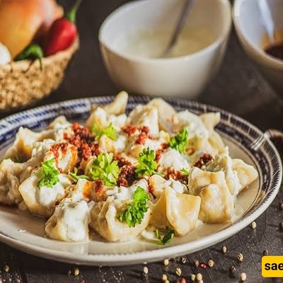 Turkish Manti Recipe: Delicious Bite-Sized Dumplings with Yogurt and Pepper Sauce