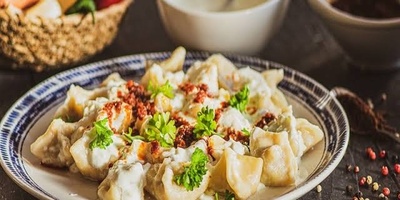 Turkish Manti Recipe: Delicious Bite-Sized Dumplings with Yogurt and Pepper Sauce