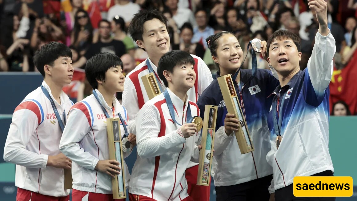 A Heartwarming Moment: The Impactful Podium Selfie of North and South Korean Athletes at the Olympics