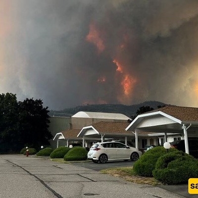 Homes Burn as More Than 20,000 People Are Forced to Evacuate in British Columbia
