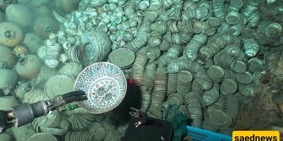 Thousands of Ancient Coins Accidentally Discovered Deep Under the Sea