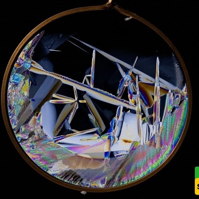 NASA Picture of the Day: Stunning Ice Crystals in Space Illuminate a Beautiful Seven-Color Rainbow with White