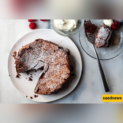 This tiny, soufflé-like chocolate cake puffs up into an impossibly flaky top, collapses into molten, fudgy crumbs, and will make you cancel every bakery run from now on.