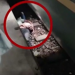 Breath-Taking Moments of a Father Under a Train; He Uses His Body as a Shield to Save His Child
