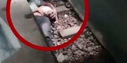 Breath-Taking Moments of a Father Under a Train; He Uses His Body as a Shield to Save His Child
