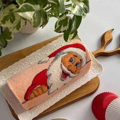 The Impressive Creativity of Osta Qannad in Baking a Special Santa Claus Roll Cake