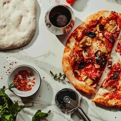 How to Make Pizza Using Barbari Bread Dough