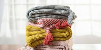 How To Store Blankets And Quilts Without Taking Up Too Much Space