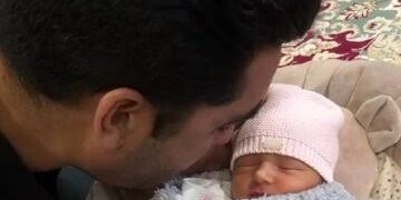 Rulings on Reciting the Adhan in a Newborn’s Ear and the Best Time to Do It
