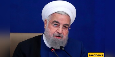 A Glimpse Into the Past: Childhood Photo of Hassan Rouhani in His Father’s Arms Goes Viral
