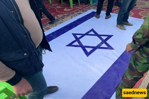 Iran’s Supreme Leader Tramples Israeli Flag in Symbolic Gesture, Calls Zionist Regime “Doomed to Collapse”
