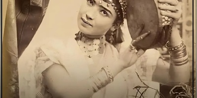 TwoPaintings by Naser al-Din Shah Qajar of a Beautiful European Woman Beside an Iranian Samovar, Pouring Tea, Wearing a Boat-neck Blouse and a Puffed Skirt / dated 1263 (1884-1885 CE).