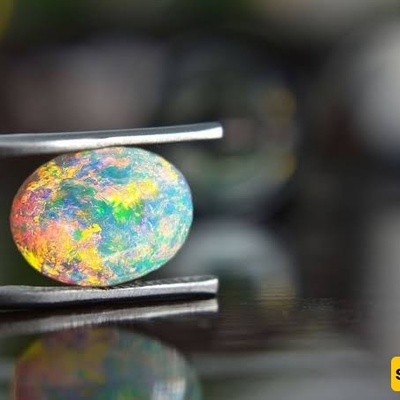 Exploring Opal: A Gemstone Celebrated for Nature’s Mesmerizing Play of Colors, with Care and Buying Guide