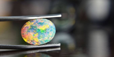 Exploring Opal: A Gemstone Celebrated for Nature’s Mesmerizing Play of Colors, with Care and Buying Guide