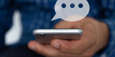 Why Does a Text Message Distract Us More Than a Phone Ring?