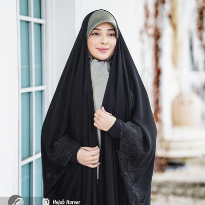What Is the Ruling on Wearing a Black Chador According to Islamic Jurisprudential Authorities?