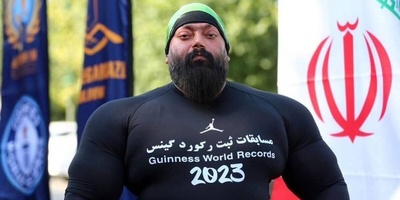Guinness Record Broken by an Iranian; Moving Two Trucks Weighing 95 Tons + Video