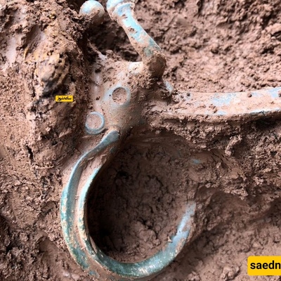 Discovery of a 2,000-Year-Old Hoard of Cooking Pots and a Long-Tongued Bronze Bull
