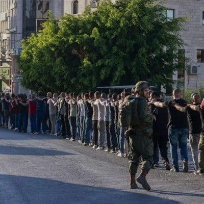 Shocking Footage Shows Israeli Soldiers Marching Palestinians in Lines