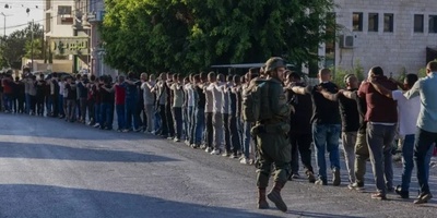 Shocking Footage Shows Israeli Soldiers Marching Palestinians in Lines
