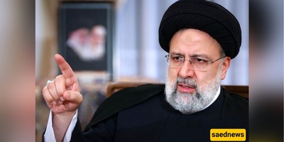 Why Did President Raisi’s Daughter Look So Somber Next to Her Grandfather on Stage?
