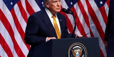 Trump’s Speech Faces Brief Disruption as Protester Shouts Criticism