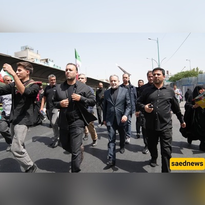 Symbolism on Display: Iran’s Flag, a Diplomat, and a Soldier Capture a Moment of Unity