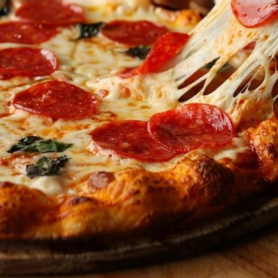 What Is Pizza Topping Cheese, and How Does It Differ from Regular Pizza Cheese?