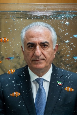 A Speech Behind Glass Walls: Why Does Reza Pahlavi Fear Even His Own Shadow?