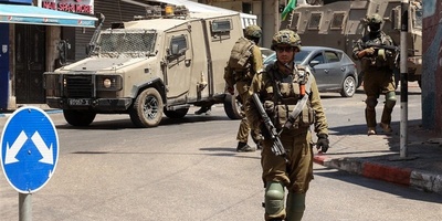 Israeli Forces Loot $447,000 in Armed Raid on Ramallah Exchange Shop