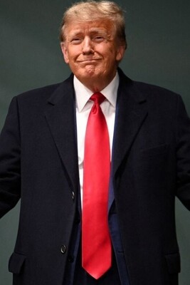 Donald Trump Strikes an Unusual Pose with the American Flag – Politician or Showman?