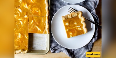 This Cheesecake-Marbled Pumpkin Slab Feeds 18( No Par-baking Required)