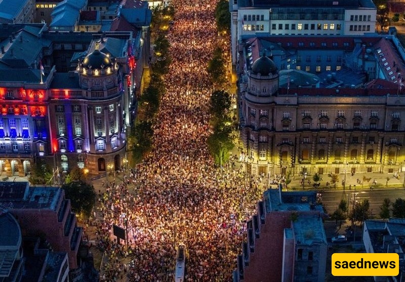 Tens of Thousands March in Serbia's Capital, Demand Snap Vote